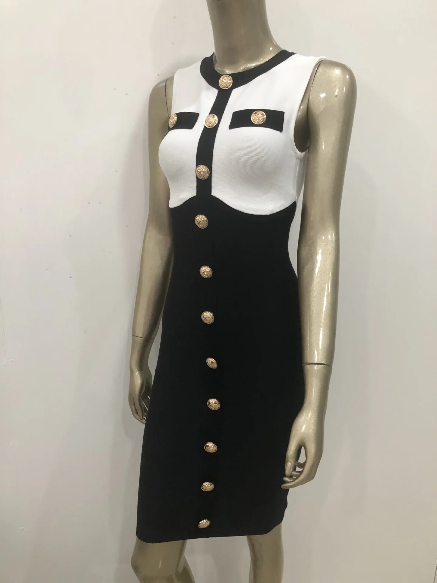 AVP PASSION: Sleeveless Black & White Bandage Dress