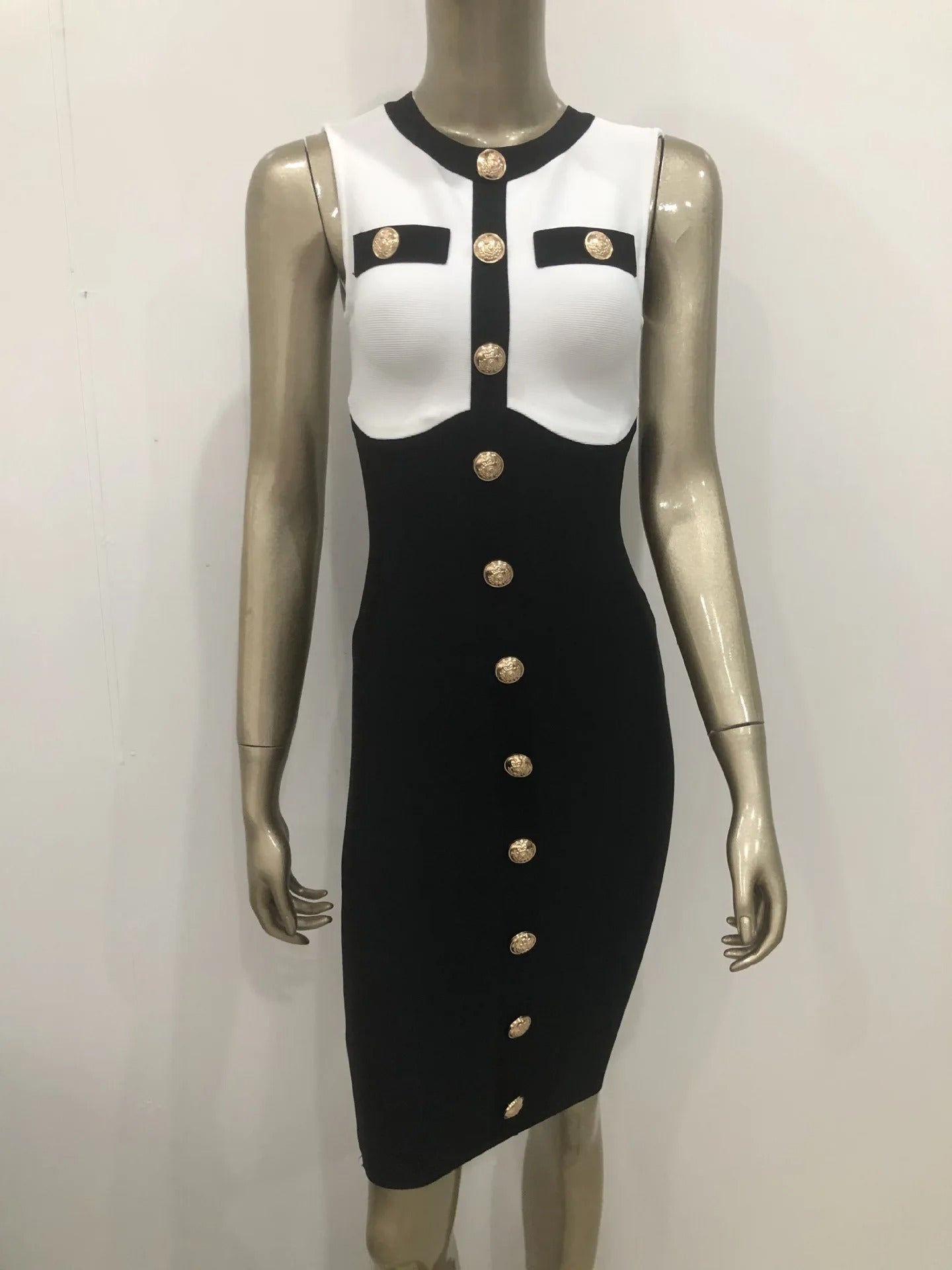 AVP PASSION: Sleeveless Black & White Bandage Dress